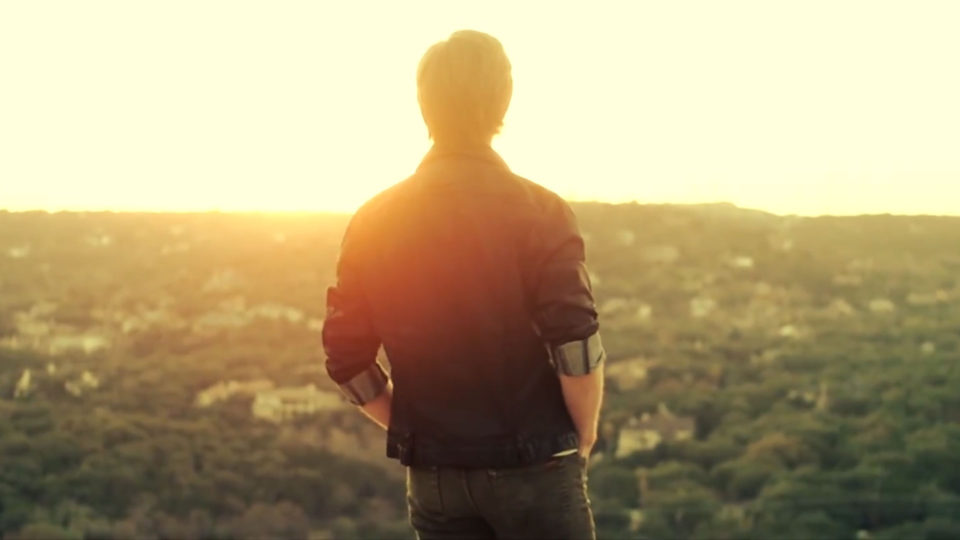 How to win 48-hour film contests - man watching sunset overlooking the city