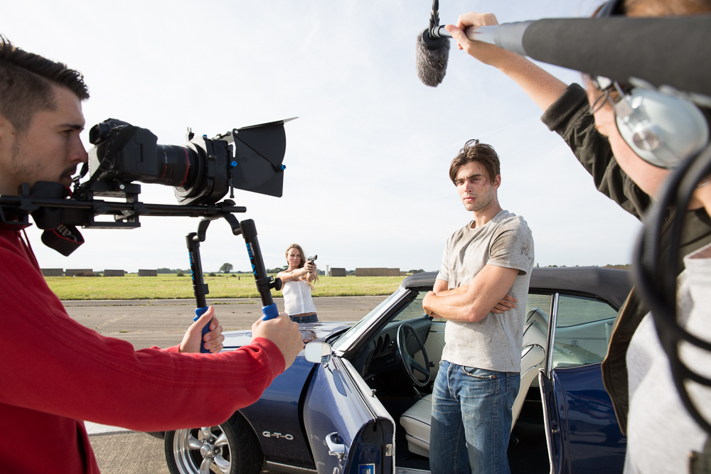 Filmmaking on a budget on set on an action short film shoot with camera and mic boom